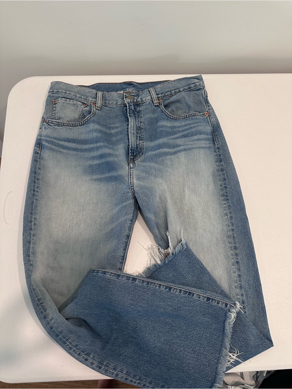 Women's Light Blue Straight Jeans with Distressed Knee